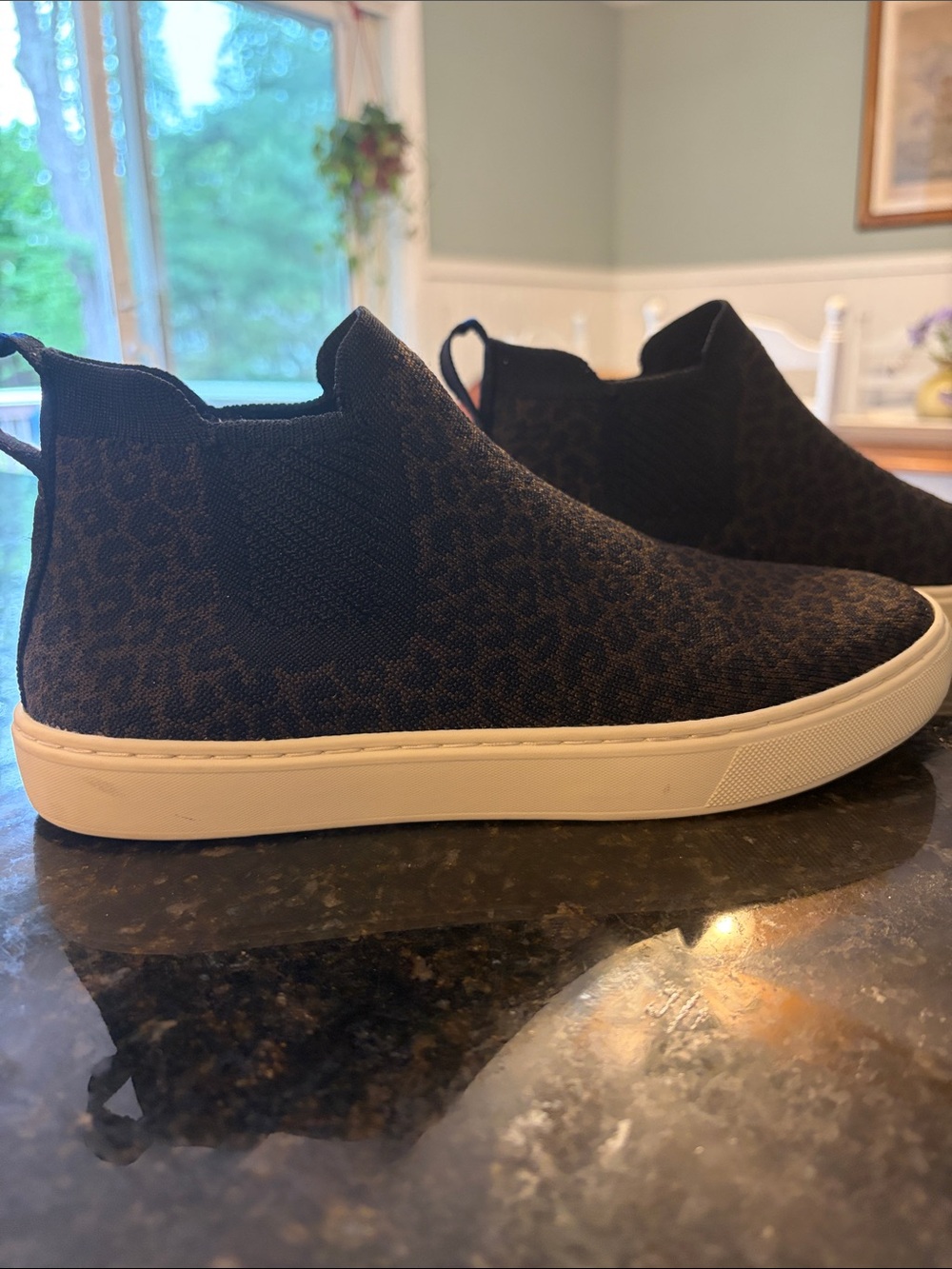 Rothy’s cheetah print hi top sneakers size 8.5